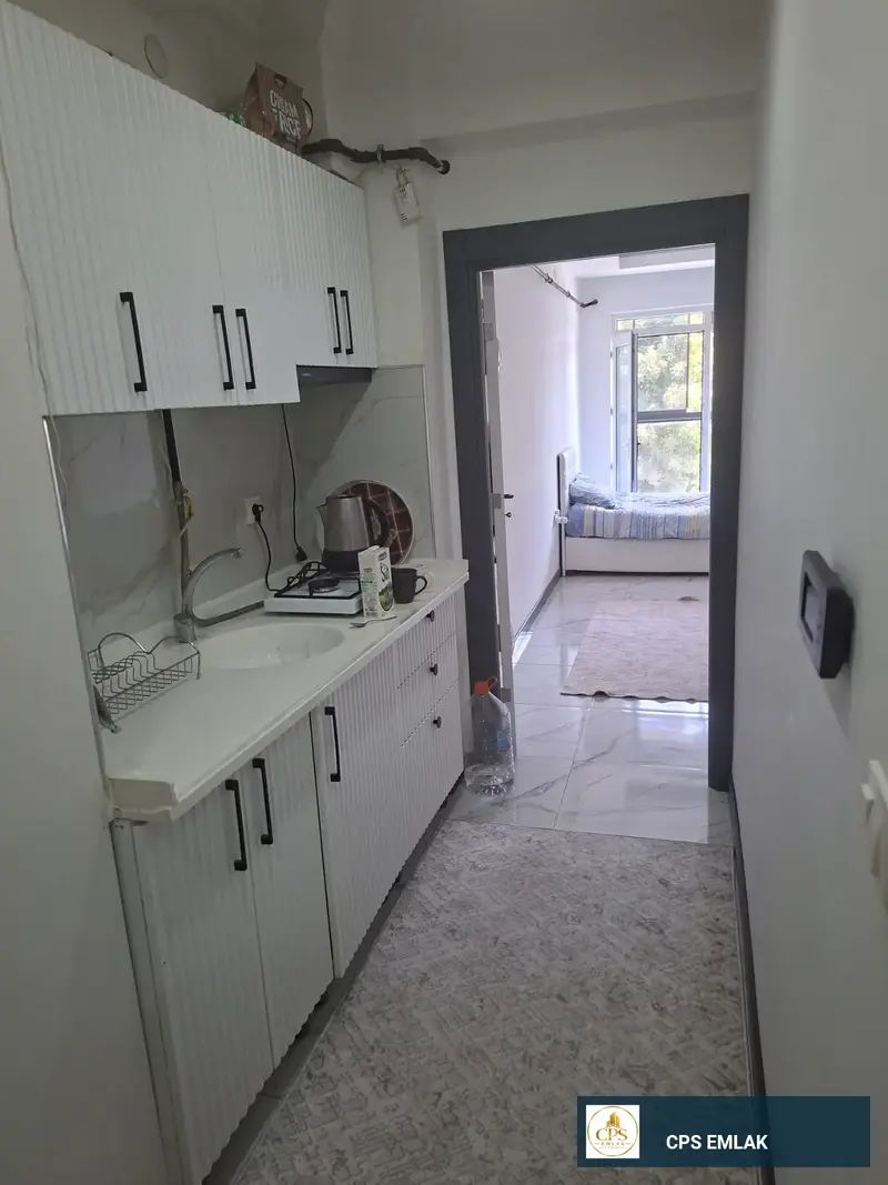 Ertaş caddesi üzeri balkonlu arka teraslı 1+1 ferah daire 